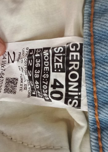 Kadın Mavi Yırtık Denim Mini Şort - Görsel 6