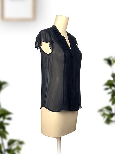 H&M H&M Bluz %70 İndirimli.