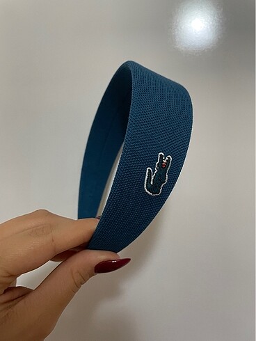 Lacoste Taç