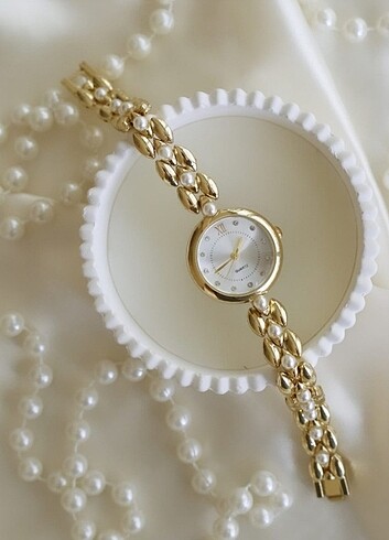Gold incili saat 