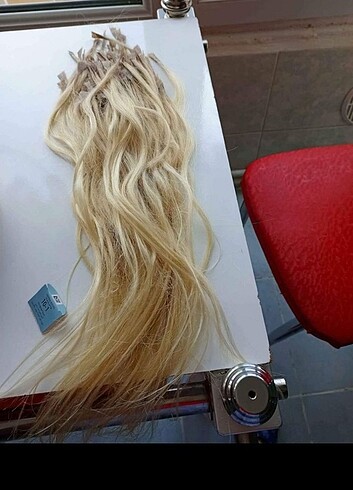 200 adete yakın 70 cm çok kaliteli orjinal saç platin