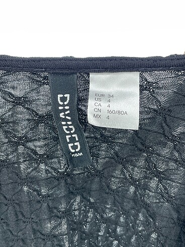 34 Beden siyah Renk H&M Kısa Elbise %70 İndirimli.