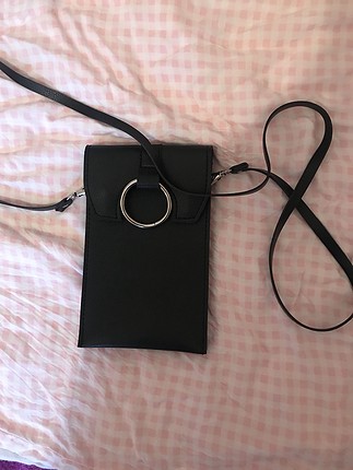 Miniso çanta telefon çantası olarak kullandım 1 kere sadece içi 