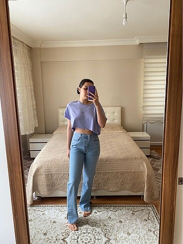 Yanları yırtmaçlı jean