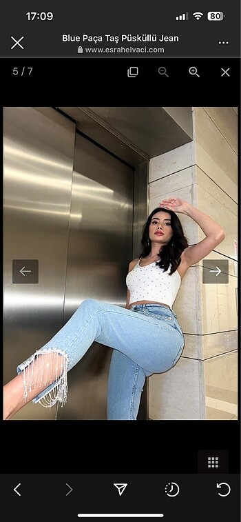 Paça püsküllü taşlı jean