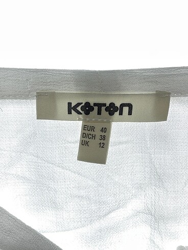 40 Beden beyaz Renk Koton Bluz %70 İndirimli.