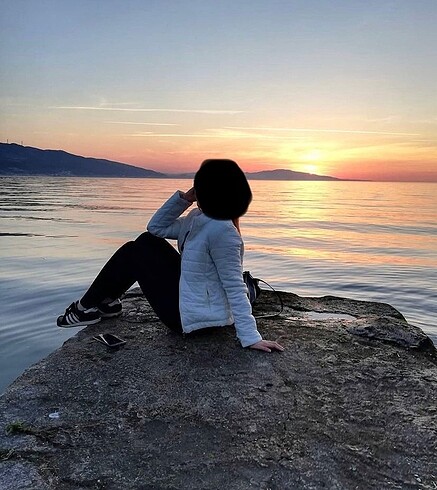 Kırık beyaz şişme mont