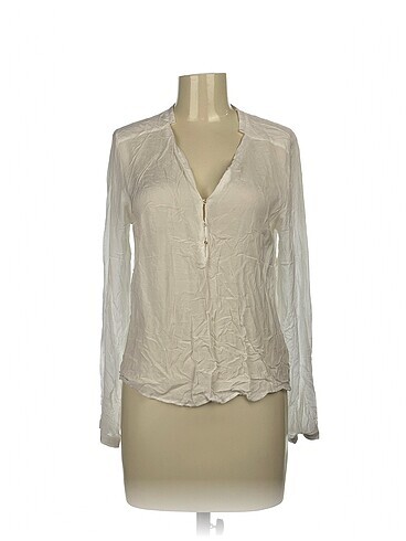 Zara Bluz %70 İndirimli.