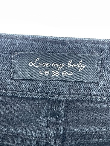 38 Beden siyah Renk Love My Body Midi Etek %70 İndirimli.