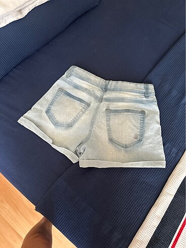 Benetton Kız çocuk likrali belden yanları lastikli ayarlı kot şort