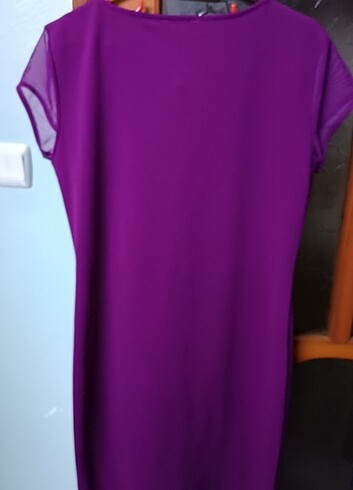 Rengiyle muhteşem duran bir elbise - Görsel 3