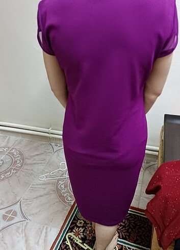 Rengiyle muhteşem duran bir elbise - Görsel 6