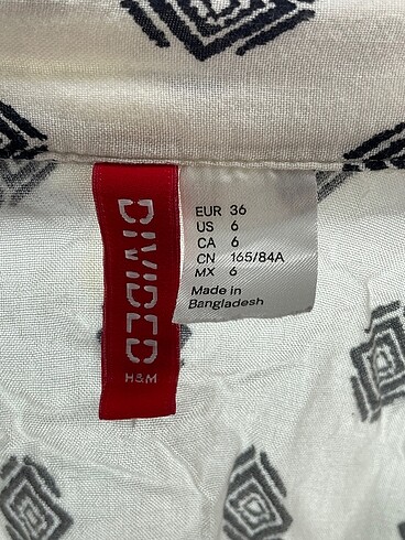 36 Beden beyaz Renk H&M Gömlek %70 İndirimli.