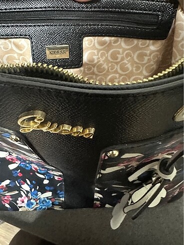 Beden GUESS ÇİÇEKLİ KOL ÇANTASI 2000 tl