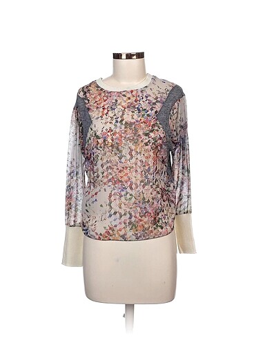 Zara Bluz %70 İndirimli.