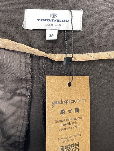 36 Beden kahverengi Renk Tom Taılor Kumaş Pantolon %70 İndirimli.