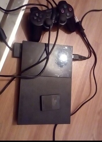 PlayStation 2 ve oyun cd