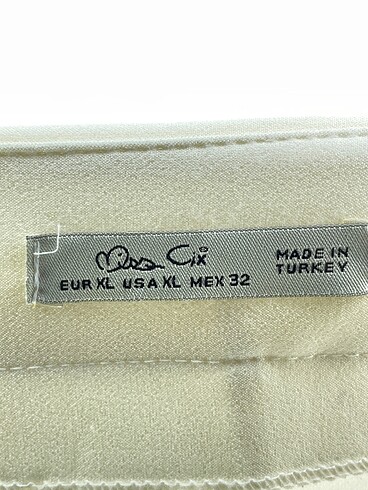 42 Beden beyaz Renk PreLoved Kumaş Pantolon %70 İndirimli.
