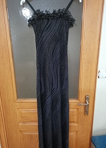 38 Beden siyah Renk 38 beden likralı simli abiye bir defa giyildi