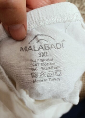 Diğer Malabadi xl iki adet diz alti kapri modal tayt tertemiz sifir gi