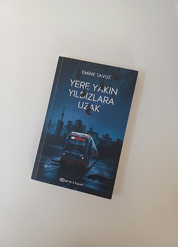 YERE YAKIN YILDIZLARA UZAK-EMİNE TAVUZ