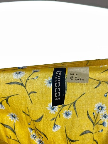 34 Beden çeşitli Renk H&M Kısa Tulum %70 İndirimli.