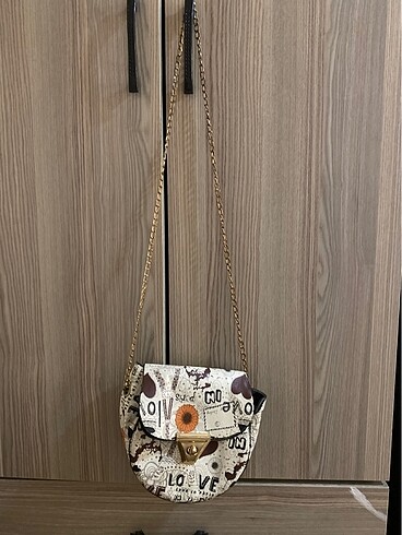 Çiçekli kol çantası