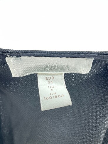 34 Beden siyah Renk H&M Uzun Tulum %70 İndirimli.