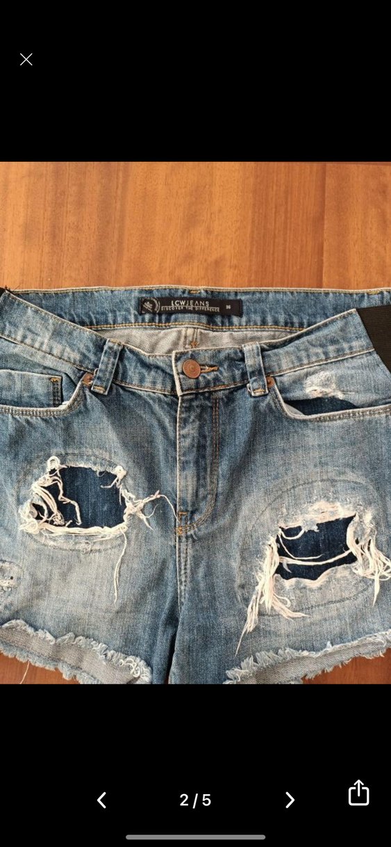 Kadın Mavi Yırtık Kot Şort - Görsel 2