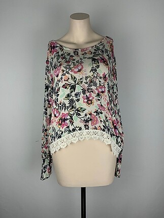 H&M Bluz %70 İndirimli.
