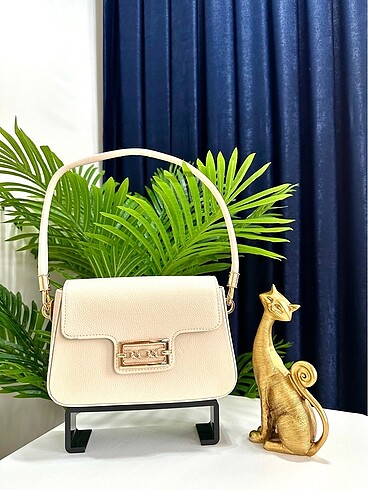 Louis Vuitton Bükülmez saplı Taş renk çanta