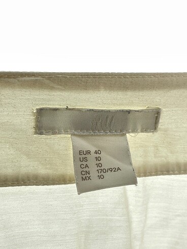 40 Beden beyaz Renk H&M Bluz %70 İndirimli.