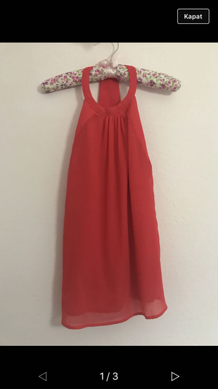 H&M Kol kısmından dar kesimli sırt dekolteli üst