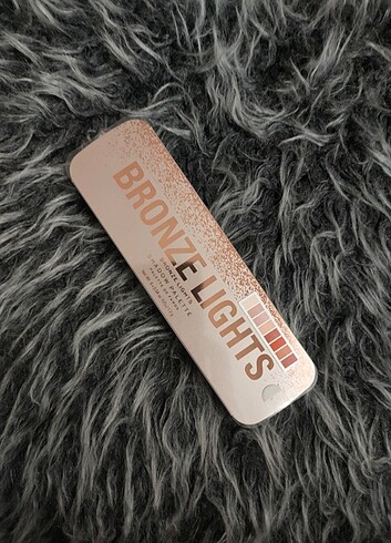 Revolution bronze light far paleti