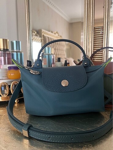 Longchamp tavuskuşu mavi pouch
