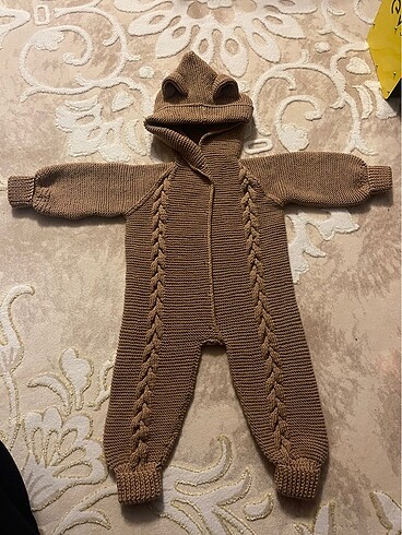 El örgüsü unisex bebek tulumu