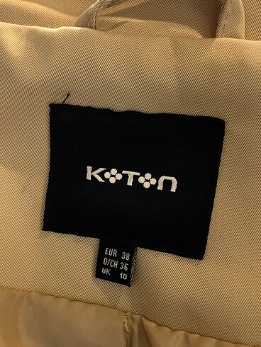 38 Beden ten rengi Renk Koton Trenchcoat %70 İndirimli.