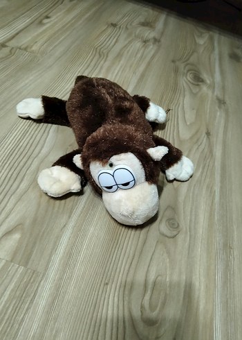 Kahverengi ve Gri Peluş Oyuncak Maymun