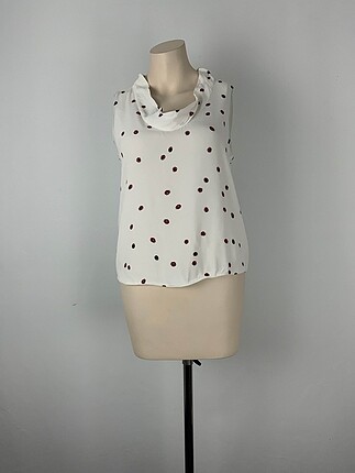 Zara Bluz %70 İndirimli.