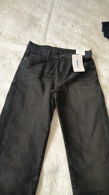 LC Waikiki Erkek çocuk LCW ayarlanabilir bel kot pantolon.