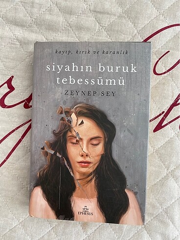SİYAHIN BURUK TEBESSÜMÜ