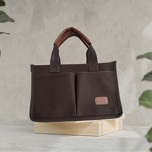THE TOTEBAG MODEL