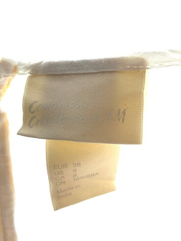 38 Beden beyaz Renk H&M Bluz %70 İndirimli.