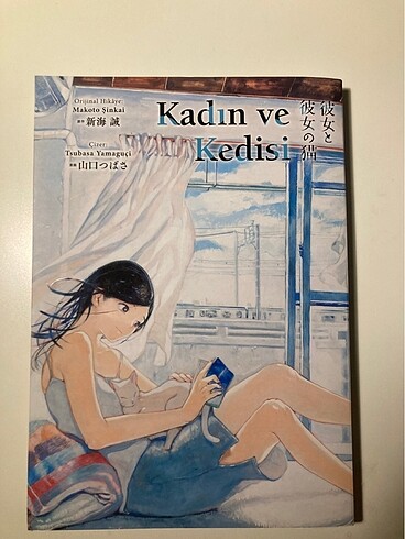 Kadın ve kedisi