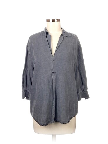 Zara Bluz %70 İndirimli.
