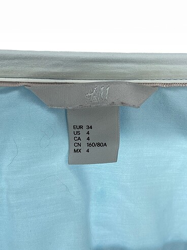 34 Beden mavi Renk H&M Gömlek %70 İndirimli.