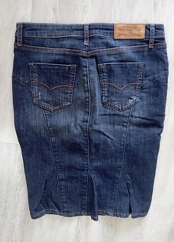 Colins dizde ucu hareketli jean etek