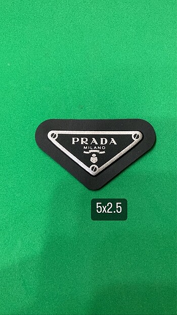 Prada pacht arma/etiket