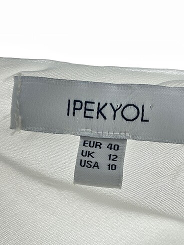 40 Beden beyaz Renk ipekyol Uzun Tulum %70 İndirimli.
