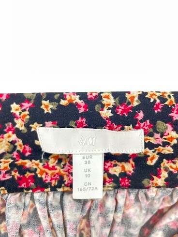 38 Beden çeşitli Renk H&M Midi Etek %70 İndirimli.